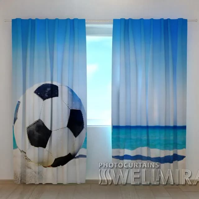 Fotogardin Fotboll på stranden