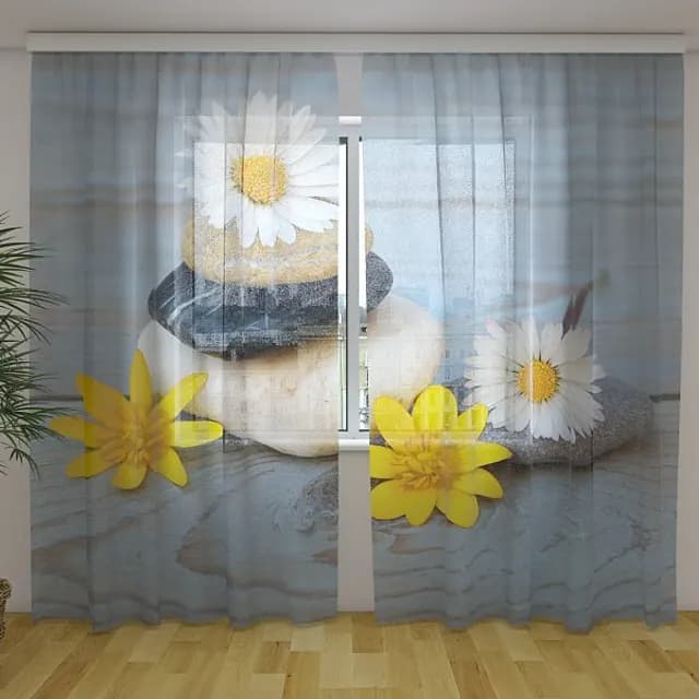 Fotogardin kamomiller och stenar